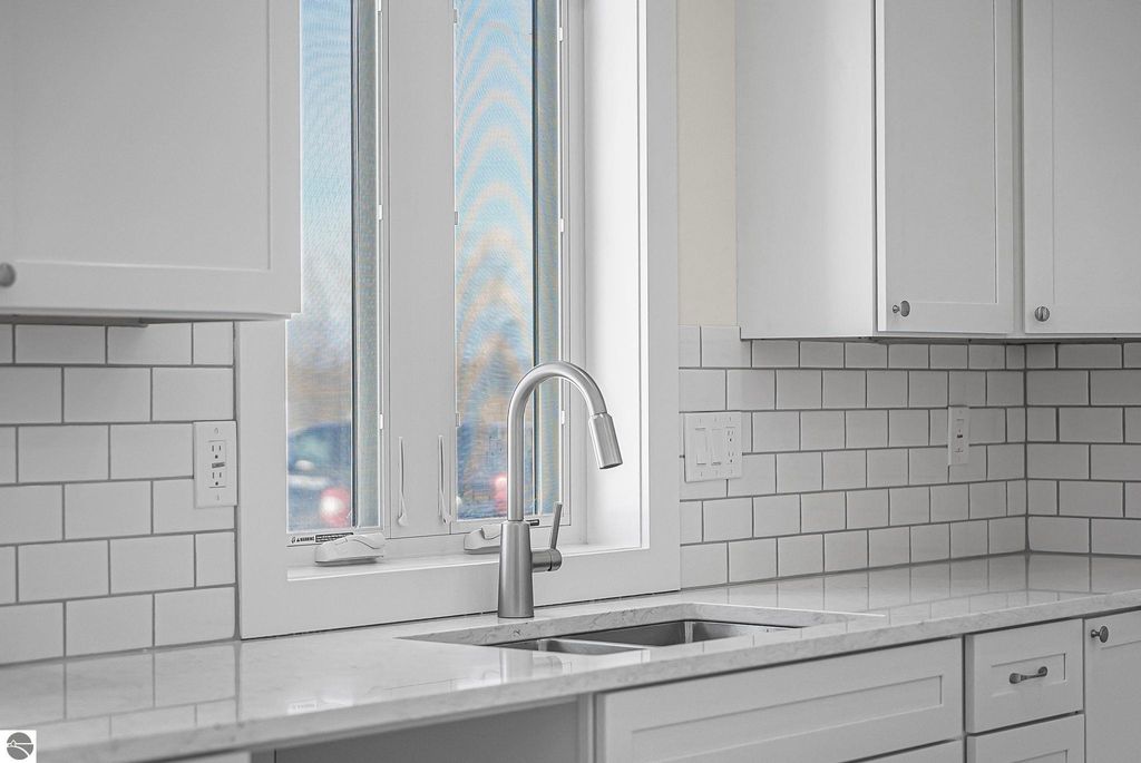 Image 14 of property listing at 4475 Edwin Boulevard, Grawn, MI 49637