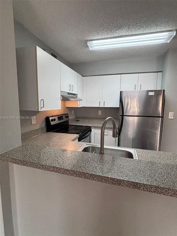 761 N Pine Island Road 203, Plantation, FL 33324