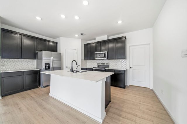 13132 Sorrento Bay Drive, Willis, TX 77318