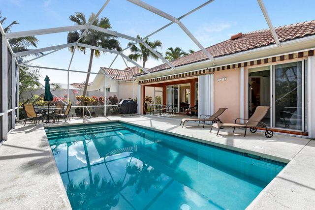 7877 Red River Road, West Palm Beach, FL 33411