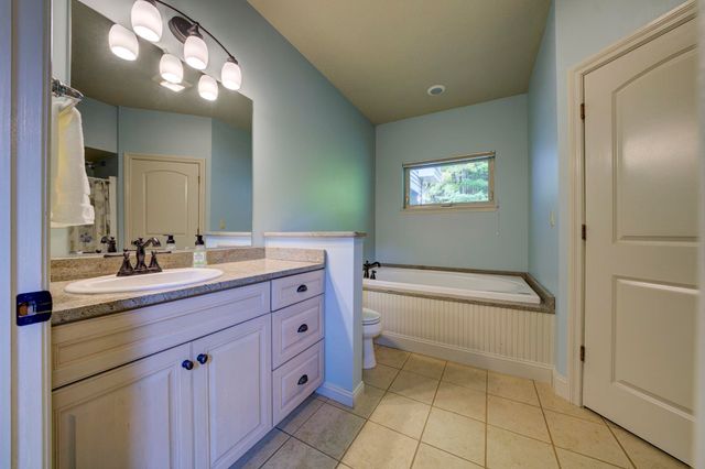 213 Wooded Valley Drive, Garfield Twp, MI 49696