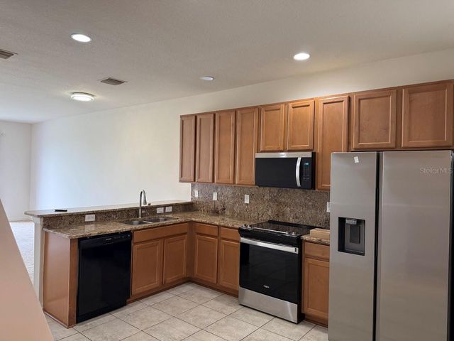 4976 WHITE SANDERLING COURT, Tampa, FL 33619