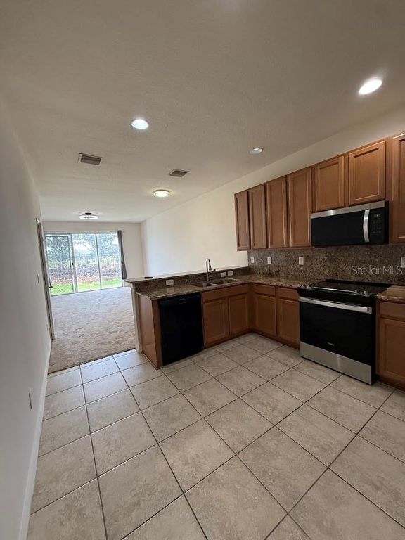Image 4 of property listing at 4976 WHITE SANDERLING COURT, Tampa, FL 33619