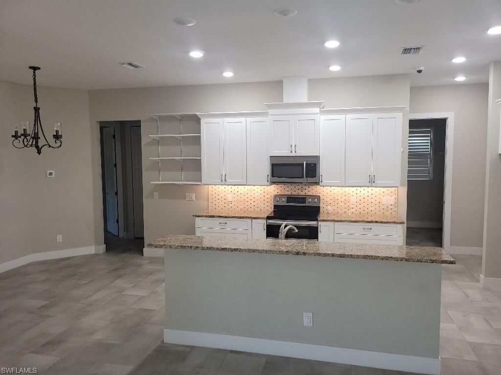 249 Rotonda CIR, ROTONDA WEST, FL 33947 — photo 4