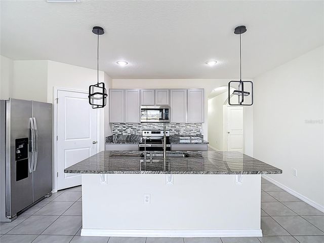 2682 COMMON FIG RUN, Wesley Chapel, FL 33543