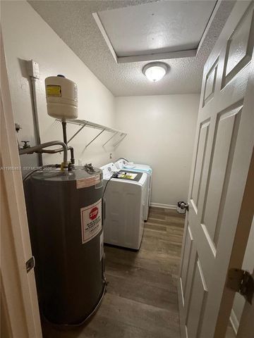 3789 Mil Pond Ct, Green Acres, FL 33463