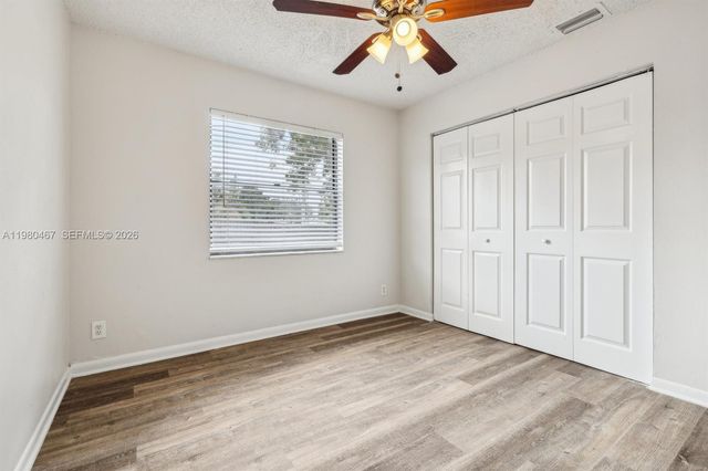 3789 Mil Pond Ct, Green Acres, FL 33463