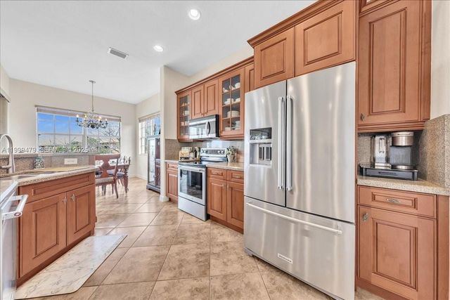8275 NW 127th Ln 34-F, Parkland, FL 33076