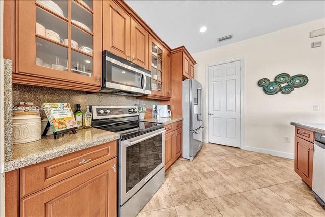 8275 NW 127th Ln 34-F, Parkland, FL 33076