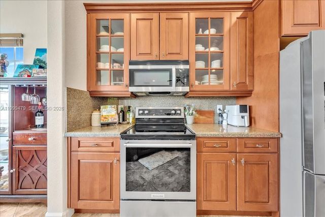 8275 NW 127th Ln 34-F, Parkland, FL 33076
