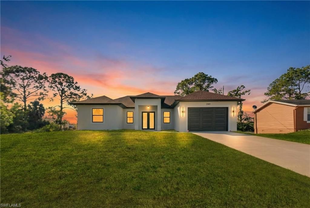 2909 9th ST W, LEHIGH ACRES, FL 33971 — exterior