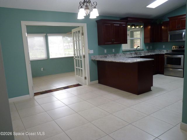 1105 Dallam Avenue NW, Palm Bay, FL 32907
