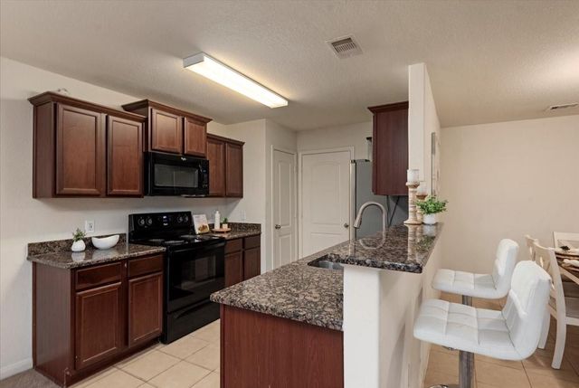 12035 Fairquarter Lane, Pinehurst, TX 77362