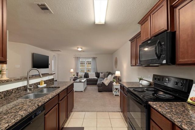 12035 Fairquarter Lane, Pinehurst, TX 77362