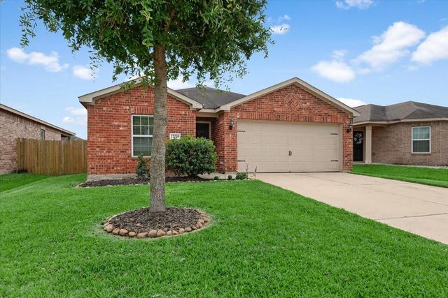 12035 Fairquarter Lane, Pinehurst, TX 77362