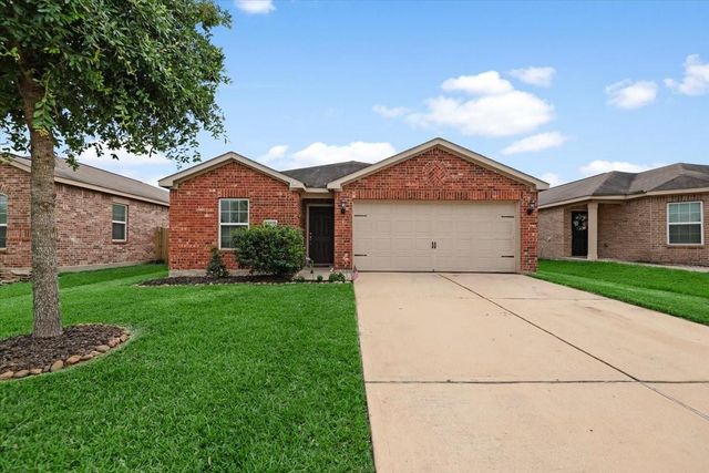12035 Fairquarter Lane, Pinehurst, TX 77362