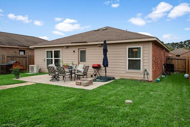 12035 Fairquarter Lane, Pinehurst, TX 77362