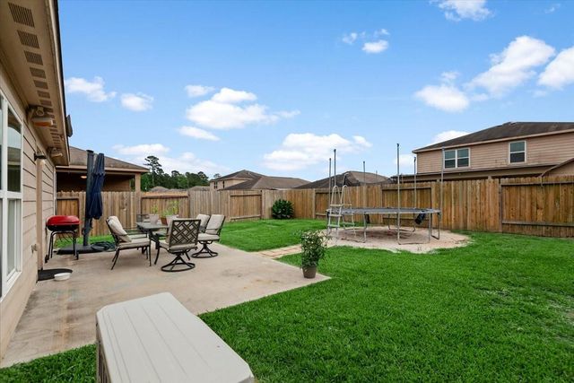 12035 Fairquarter Lane, Pinehurst, TX 77362