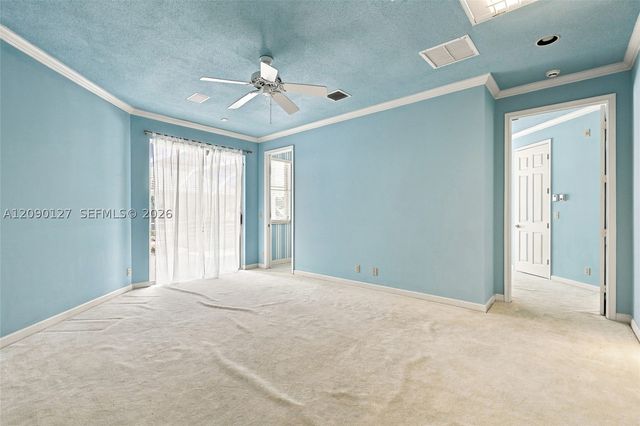 173 Orange Tree Dr, Atlantis, FL 33462