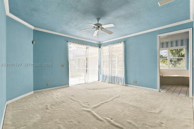 173 Orange Tree Dr, Atlantis, FL 33462