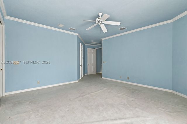 173 Orange Tree Dr, Atlantis, FL 33462