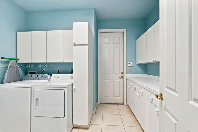 173 Orange Tree Dr, Atlantis, FL 33462