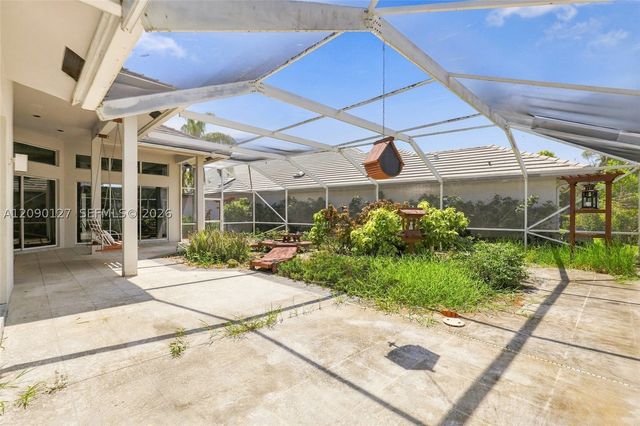 173 Orange Tree Dr, Atlantis, FL 33462