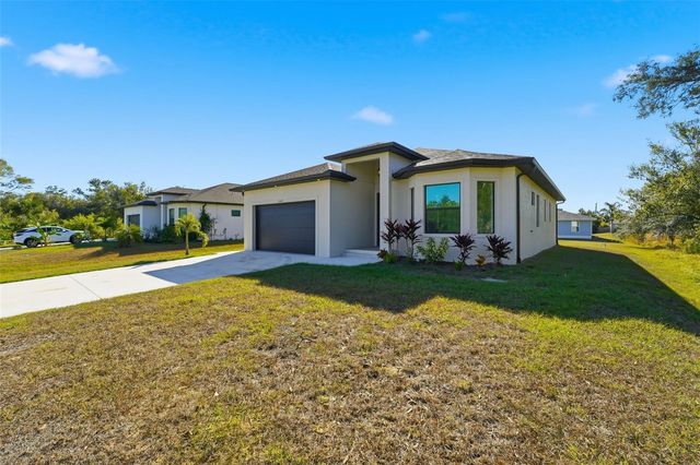 12005 CARNIVAL AVENUE, Port Charlotte, FL 33981