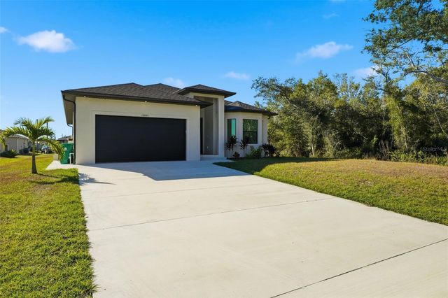 12005 CARNIVAL AVENUE, Port Charlotte, FL 33981