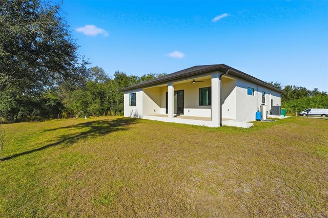 12005 CARNIVAL AVENUE, Port Charlotte, FL 33981