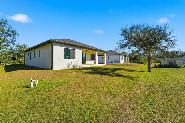 12005 CARNIVAL AVENUE, Port Charlotte, FL 33981