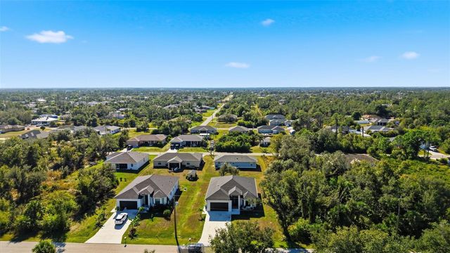 12005 CARNIVAL AVENUE, Port Charlotte, FL 33981