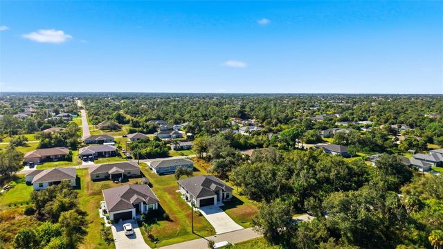 12005 CARNIVAL AVENUE, Port Charlotte, FL 33981