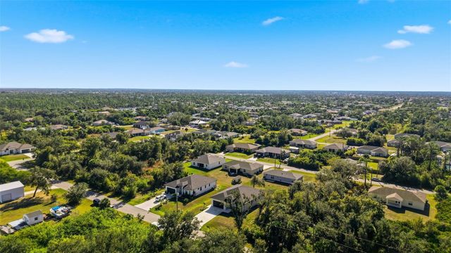 12005 CARNIVAL AVENUE, Port Charlotte, FL 33981