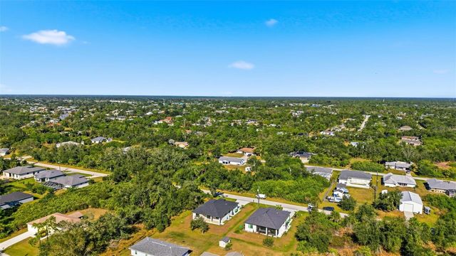 12005 CARNIVAL AVENUE, Port Charlotte, FL 33981