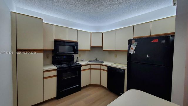 3858 Coral Tree Circle 205, Coconut Creek, FL 33073