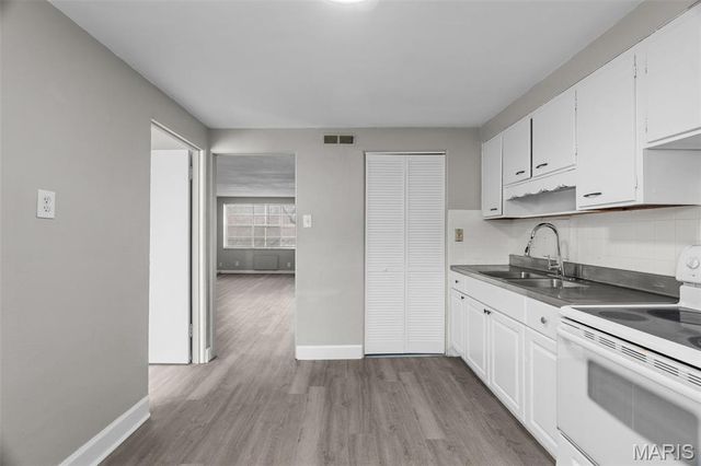 1000 Wild Cherry Lane, University City, MO 63130