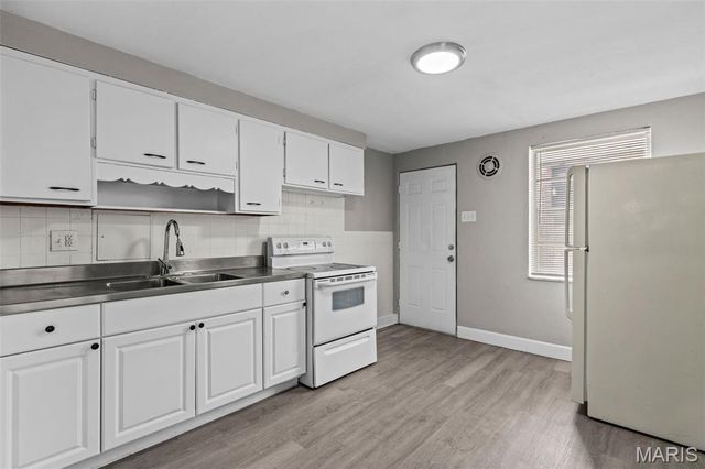 1000 Wild Cherry Lane, University City, MO 63130