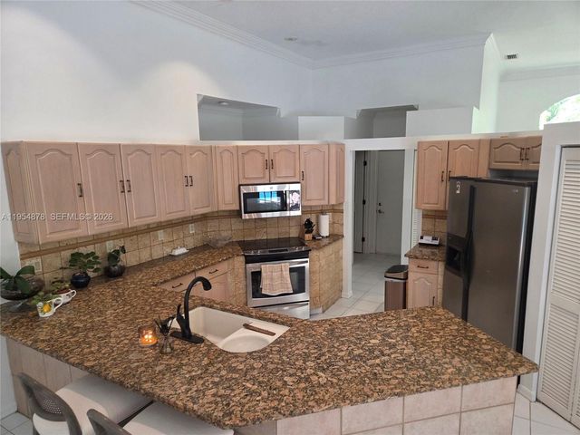 900 Spoonbill Circle, Weston, FL 33326