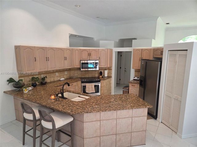 900 Spoonbill Circle, Weston, FL 33326