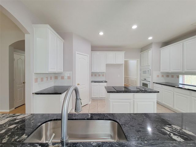 9410 Barretts Glen Court, Houston, TX 77065