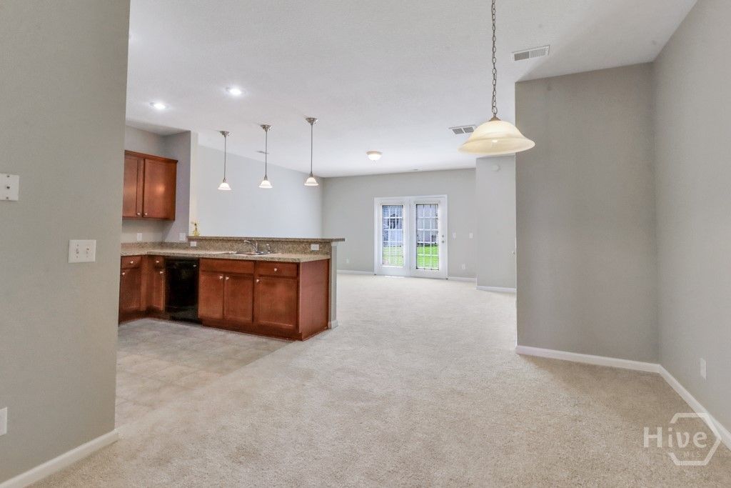 Image 4 of property listing at 65 Canyon Oak Loop, Richmond Hill, GA 31324