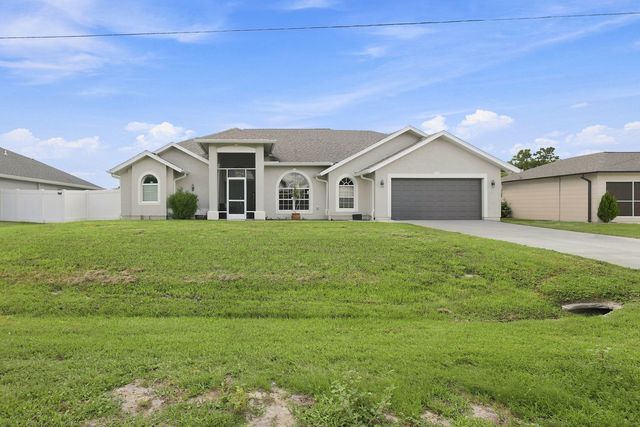 680 MANHATTAN Street E, Lehigh Acres, FL 33974