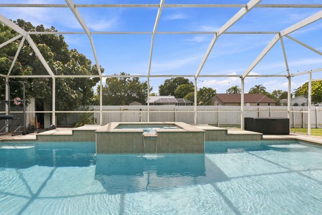680 MANHATTAN Street E, Lehigh Acres, FL 33974