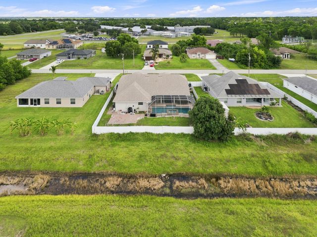 680 MANHATTAN Street E, Lehigh Acres, FL 33974