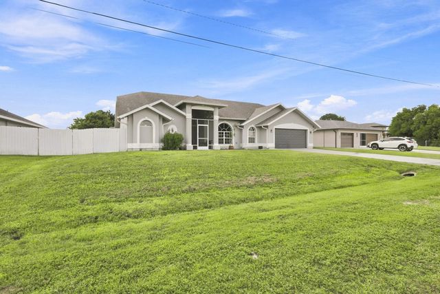 680 MANHATTAN Street E, Lehigh Acres, FL 33974