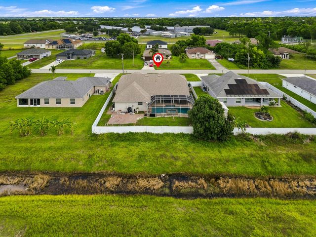 680 MANHATTAN Street E, Lehigh Acres, FL 33974