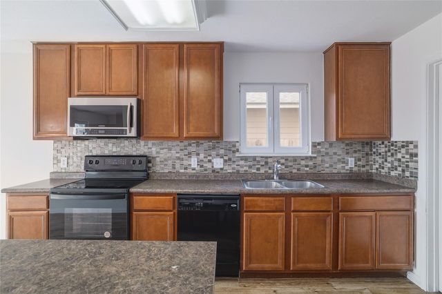 13237 Coomes DR, Del Valle, TX 78617