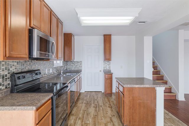 13237 Coomes DR, Del Valle, TX 78617