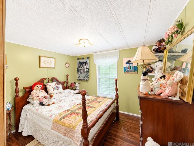 21042 Holmes Dr, Central, LA 70791